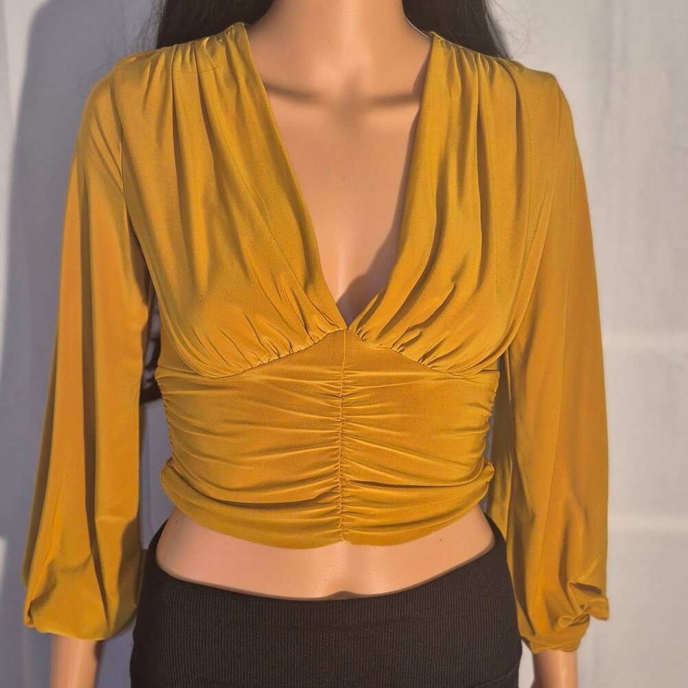 21 saints' ***stylish gold cropped top in size Medium
